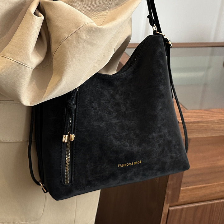Damen Hobo-Tasche aus hochwertigem Kunstleder mit dekorativen Reißverschlussdetails Nord Taschen