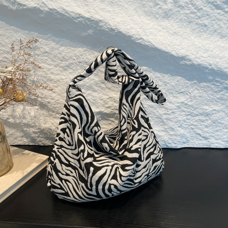 Damen trendy Beuteltasche im Zebra-Design Nord Taschen