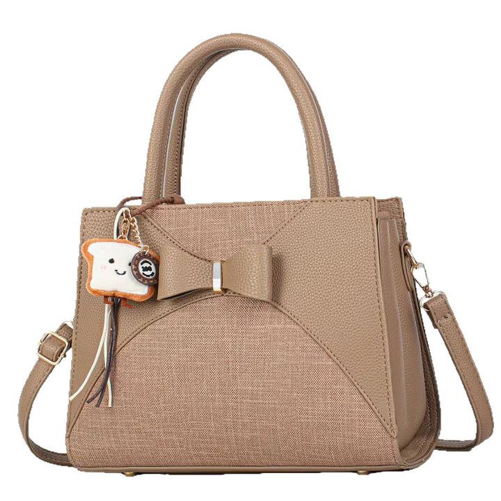 Damen elegante Handtasche mit Schleifenakzent und verspieltem Anhänger Nord Taschen