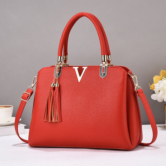 Damen Designer-Handtasche mit eleganter Quaste und abnehmbaren Schulterriemen Nord Taschen