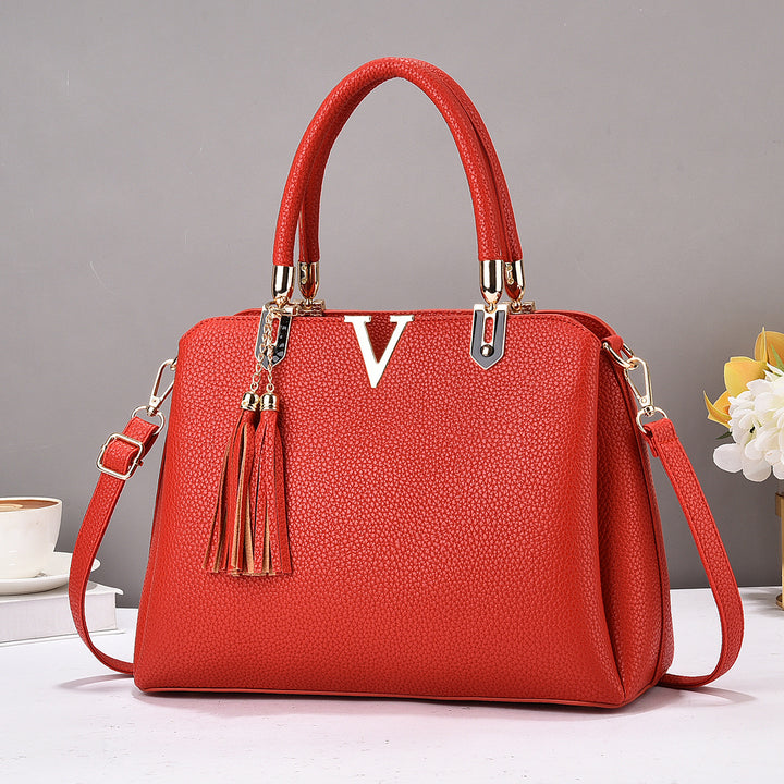 Damen Designer-Handtasche mit eleganter Quaste und abnehmbaren Schulterriemen Nord Taschen