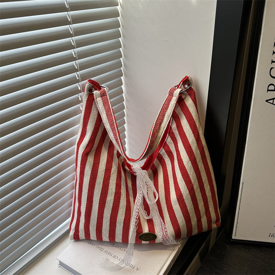 Damen Hobo-Tasche mit modernem Streifenmuster und verspieltem Kordelzug Nord Taschen
