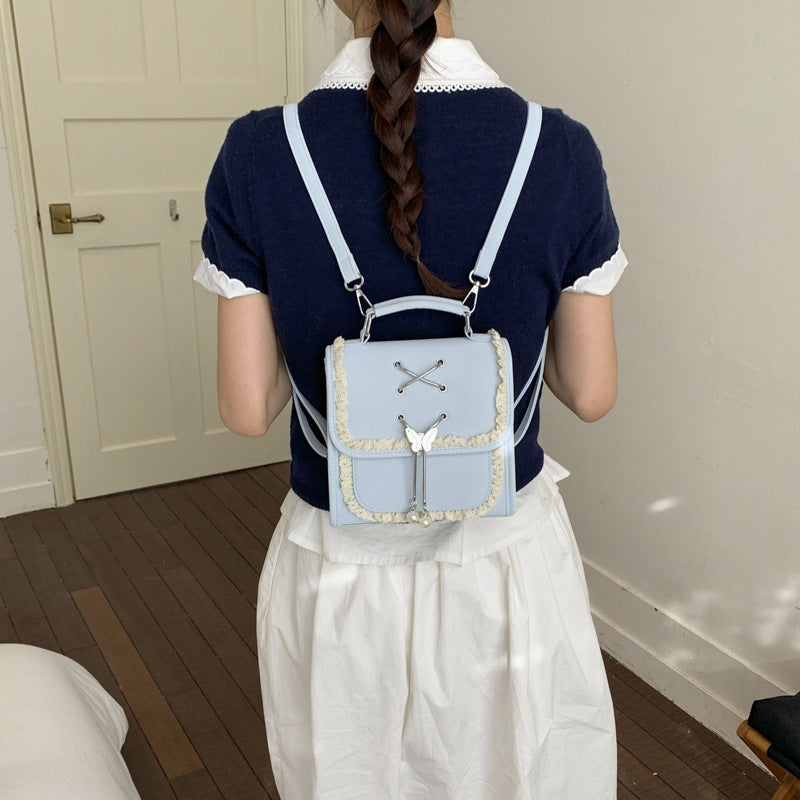 Damen Rucksack mit verspieltem Spitzenakzent und dekorativem Anhänger Nord Taschen