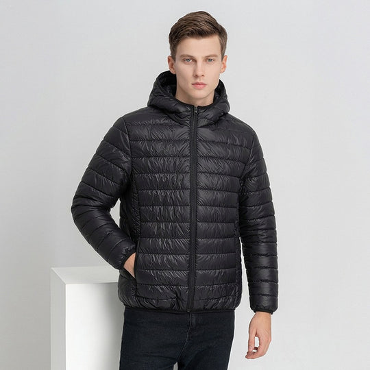 Herren Packbare Minimalistische Stepp-Kapuzenjacke mit wasserabweisender Außenlage & Thermofaser Nord Taschen