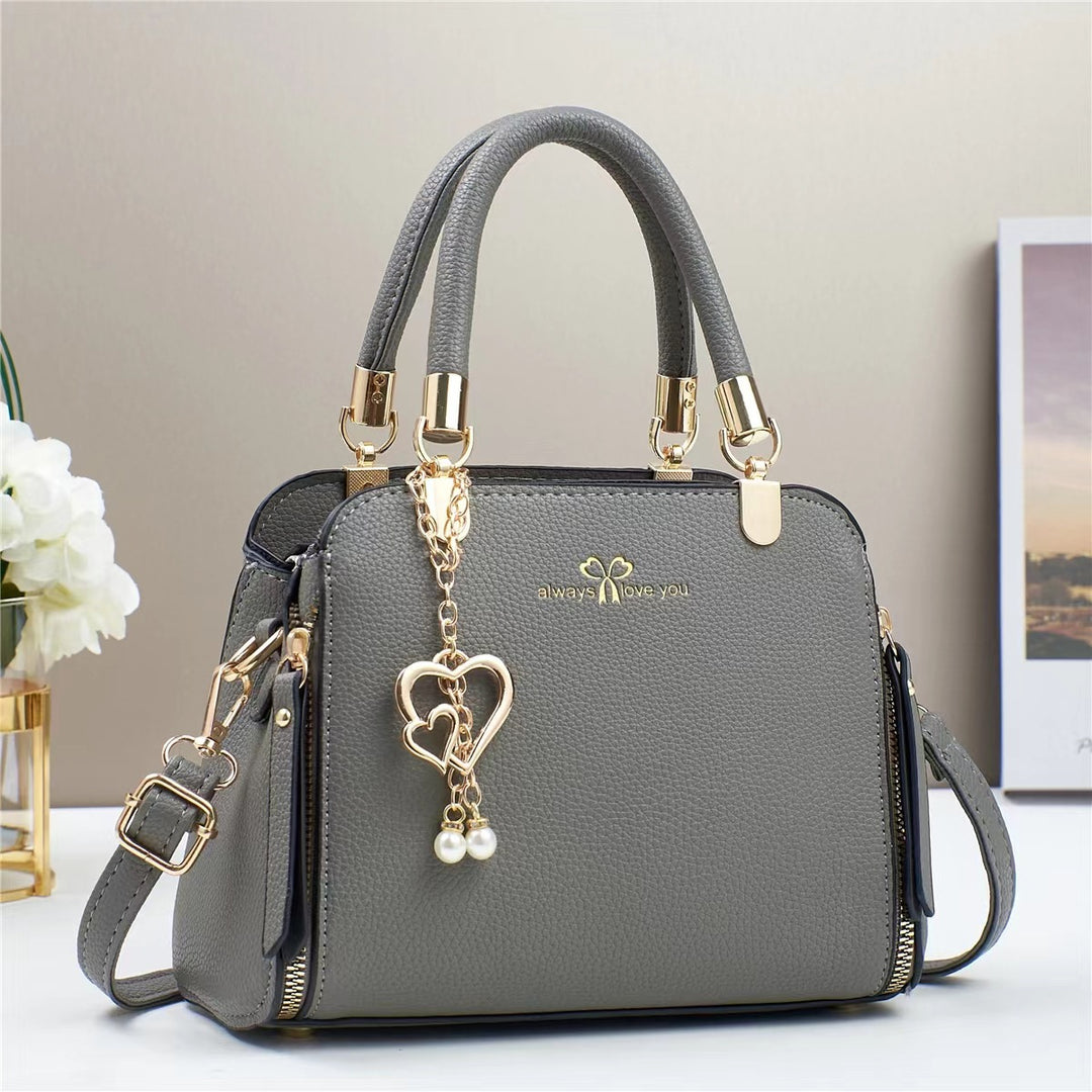 Damen strukturiertes Handtaschen-Design mit abnehmbarer Quaste Nord Taschen