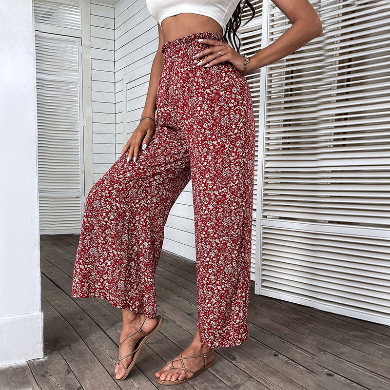 Damen Weite hochgeschnittene Palazzo‑Hose mit floralem Muster und seitlichem Beinschlitz Nord Taschen