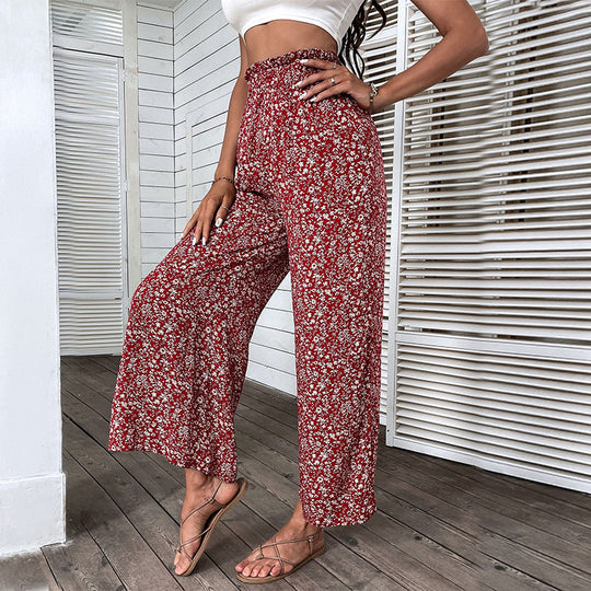 Damen Weite hochgeschnittene Palazzo‑Hose mit floralem Muster und seitlichem Beinschlitz Nord Taschen