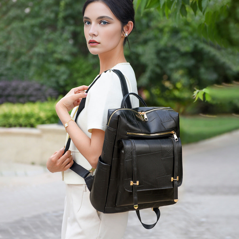 Damen eleganter Rucksack mit strukturiertem Design und goldenen Akzenten Nord Taschen