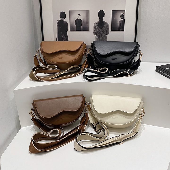 Damen Umhängetasche mit elegantem Kurvenmuster und praktischen Fächern Nord Taschen