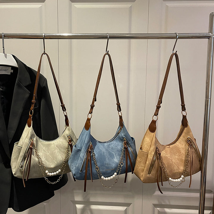 Damen Umhängetasche mit eleganten Ketten- und Perlenakzenten Nord Taschen