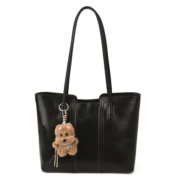 Damen elegante Henkeltasche mit charmantem Plüschanhänger Nord Taschen