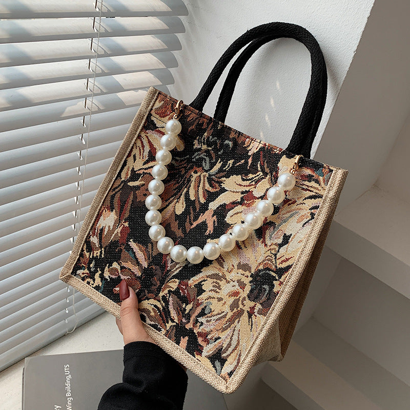 Damen Einkaufstasche mit floralem Jacquard-Muster und eleganter Perlenverzierung Nord Taschen