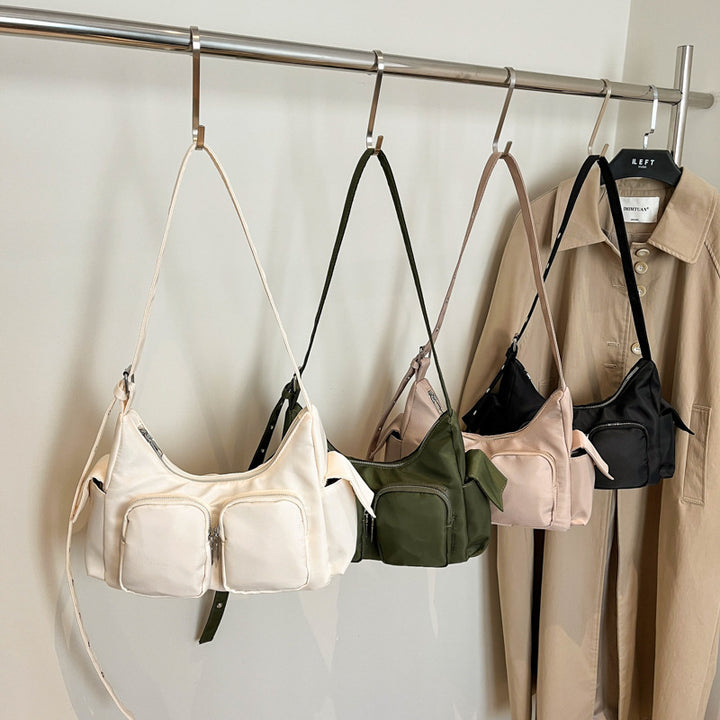 Damen Umhängetasche mit praktischen Vorderfächern und modischem Design Nord Taschen