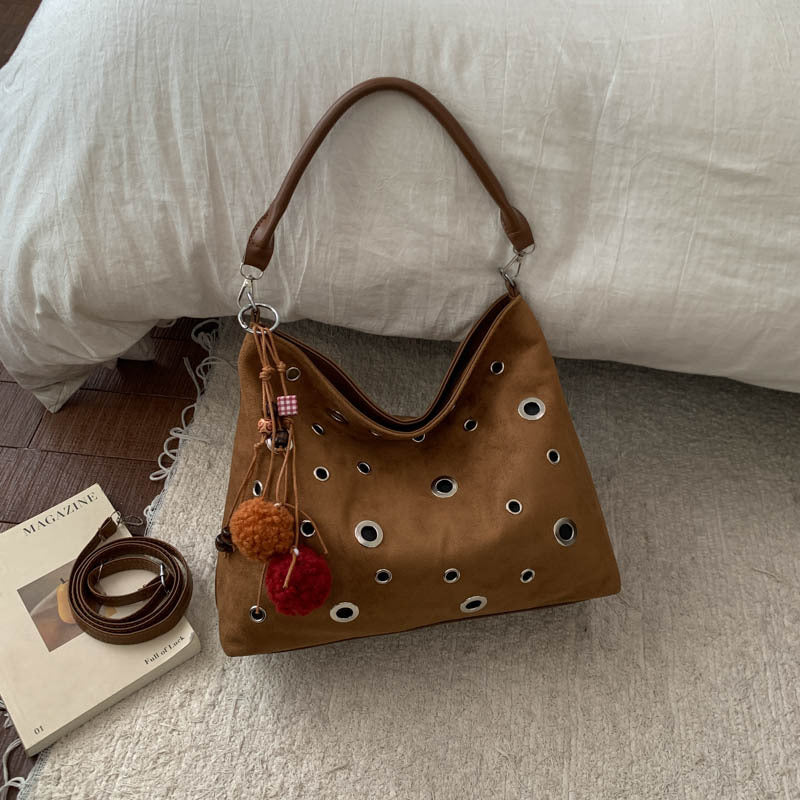 Damen modische Schultertasche mit einzigartiger Loch-Applikation Nord Taschen