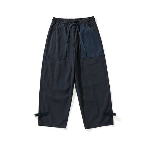 Herren weite Cropped Cargo‑Hose mit elastischem Tunnelzugbund, aufgesetzten Taschen und verstellbaren Knöchelriemen Nord Taschen
