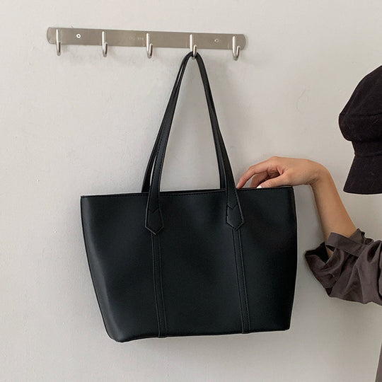 Damen eleganter Shopper mit strukturierten Details und geräumigem Innenraum Nord Taschen
