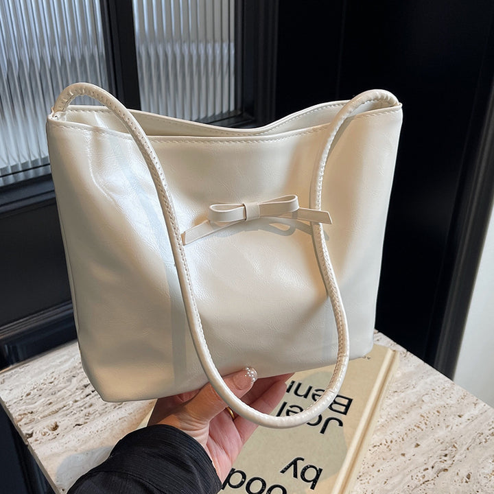 Damen Henkeltasche mit elegantem Schleifendetail und hochwertiger Lederoberfläche Nord Taschen