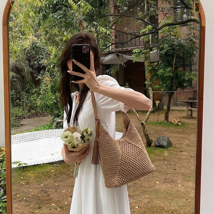 Damen trendige Hobo-Tasche aus handgewebtem Material mit stilvoller Quaste Nord Taschen