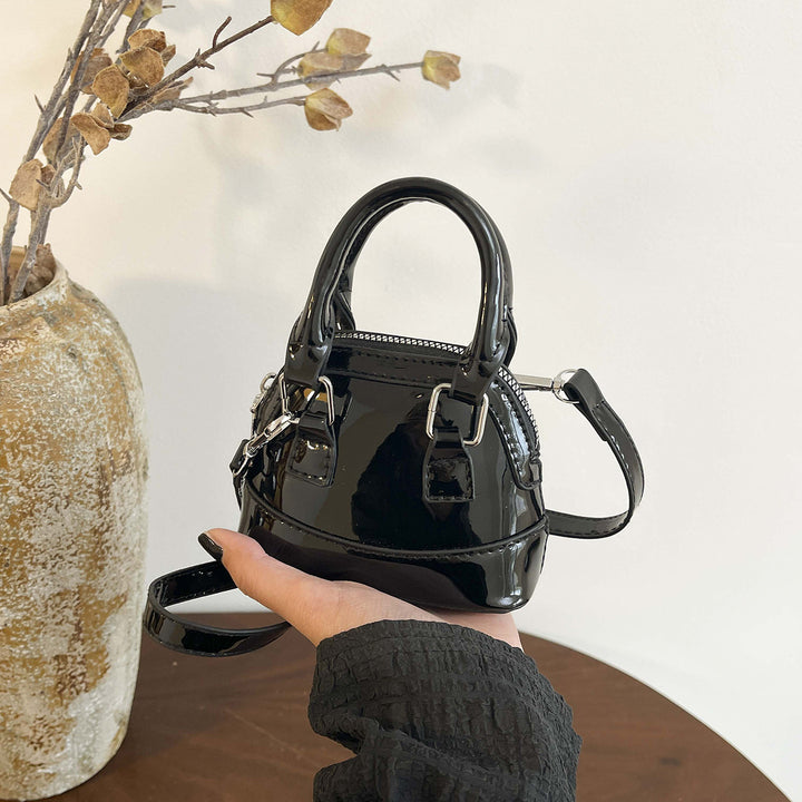 Damen Mini-Handtasche mit glänzender Oberfläche und modischem Reißverschluss Nord Taschen
