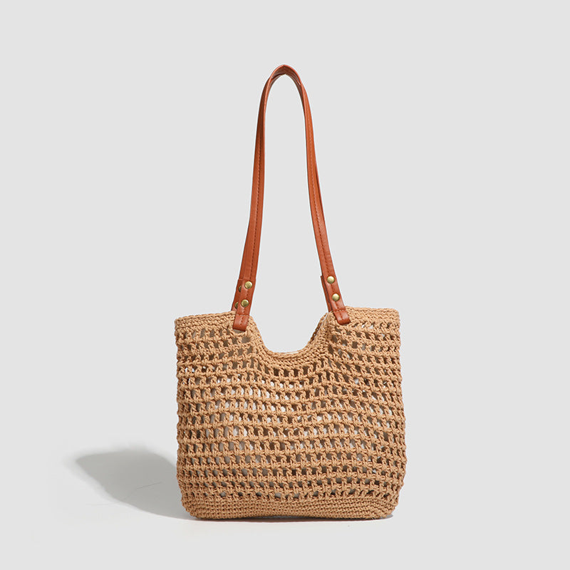 Damen Handtasche aus gewebtem Naturmaterial mit eleganten Lederakzenten Nord Taschen