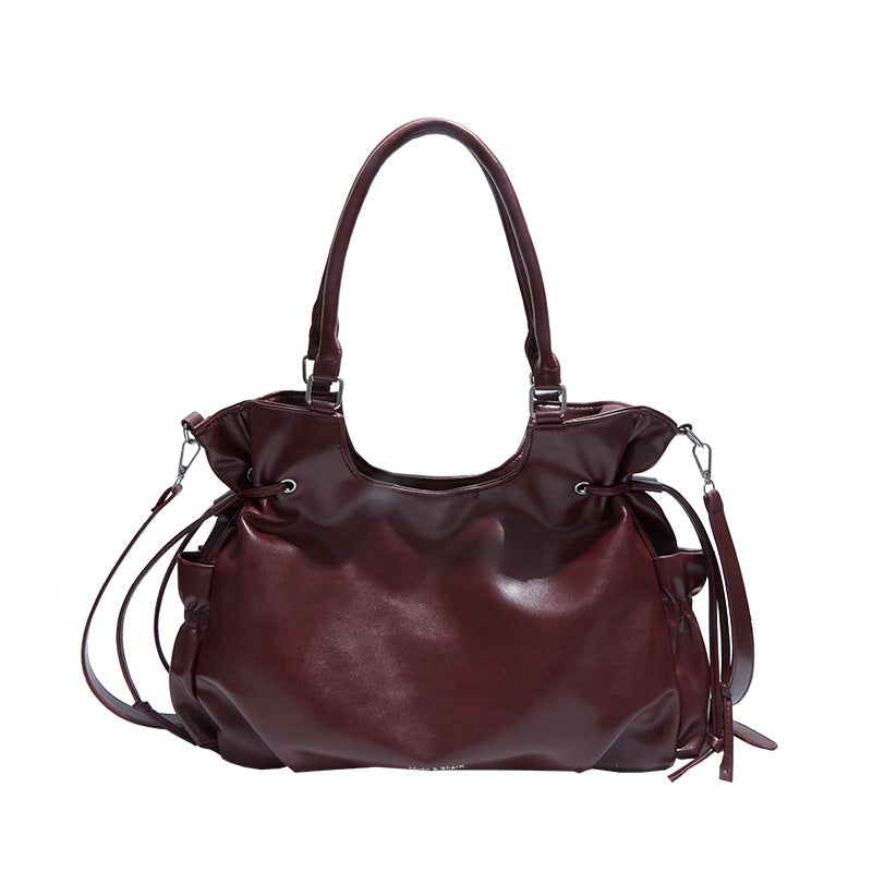 Damen Schultertasche mit modernen Raffungselementen Nord Taschen
