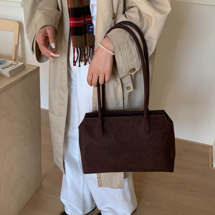 Damen elegante Handtasche aus weichem Kunstleder Nord Taschen