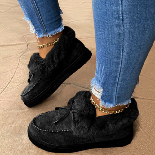Damen Kuschel‑Mokassin‑Slipper mit hochfloriger Fellmanschette, dekorativer Steppnaht und leichtem Plateau‑Sohlenprofil Nord Taschen