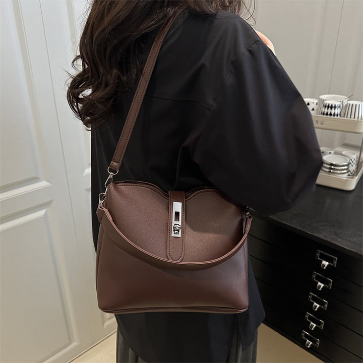 Damen elegante Umhängetasche mit hochwertiger Lederstruktur und modischem Verschluss Nord Taschen