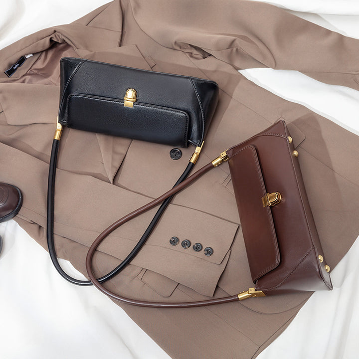 Damen Clutch mit eleganter Faltoptik und stilvollen Metallakzenten Nord Taschen