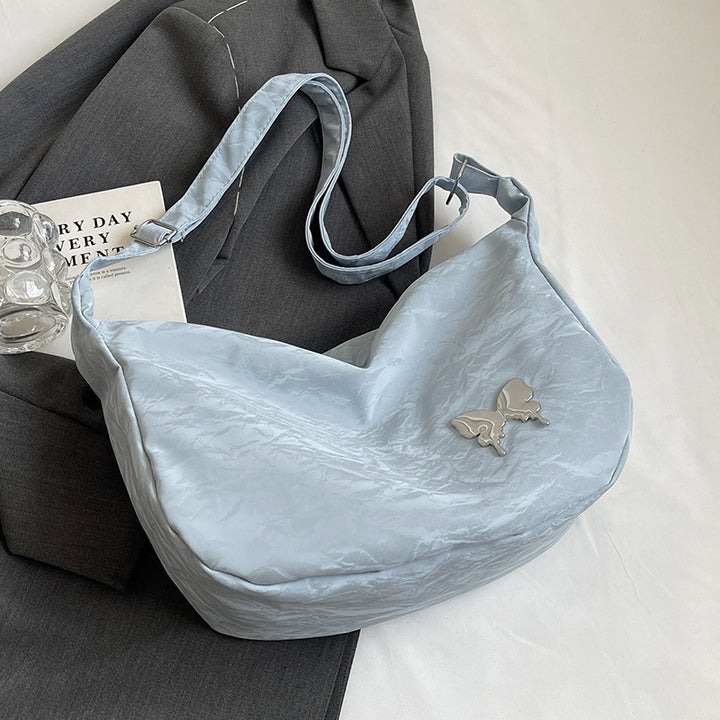 Damen Umhängetasche aus leichtem Material mit dekorativem Schmetterlingsdetail Nord Taschen