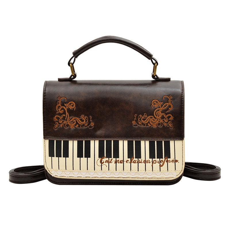 Damen Handtasche mit Klaviermotiv Nord Taschen