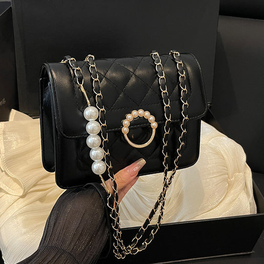 Damen elegante Umhängetasche mit strukturiertem Obermaterial und goldener Verzierung Nord Taschen