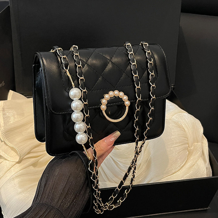 Damen elegante Umhängetasche mit strukturiertem Obermaterial und goldener Verzierung Nord Taschen