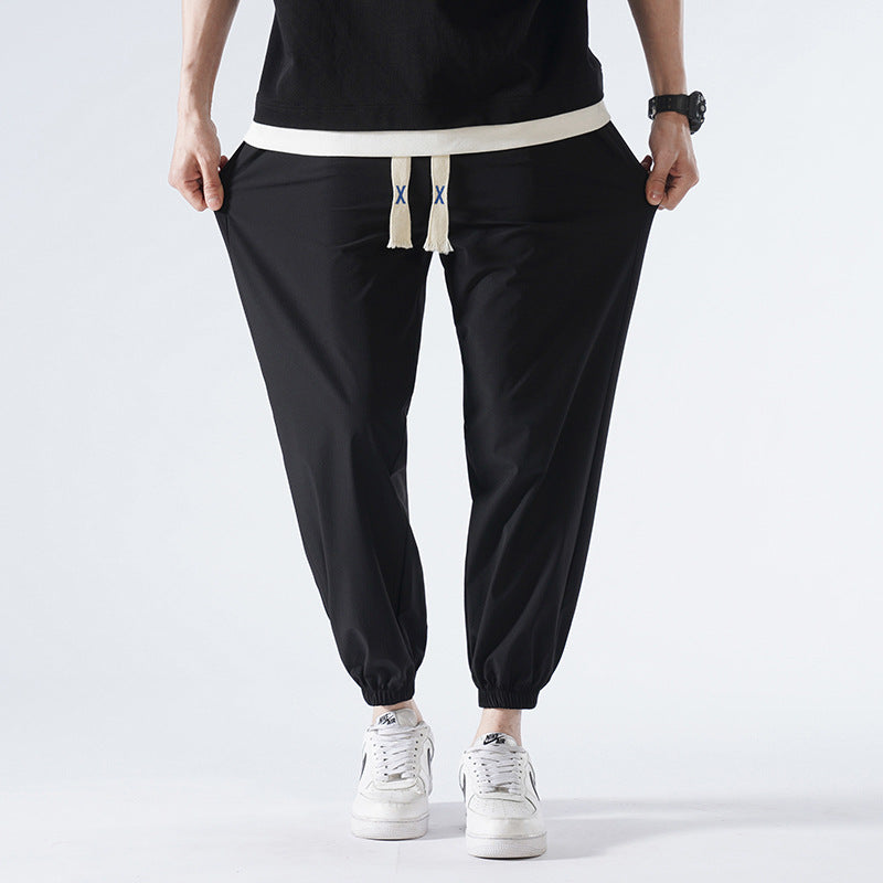 Herren Leichte Relax-Fit-Loungehose aus atmungsaktivem Jersey mit elastischem Tunnelbund, breitem Kordelzug & geripptem Beinabschluss Nord Taschen