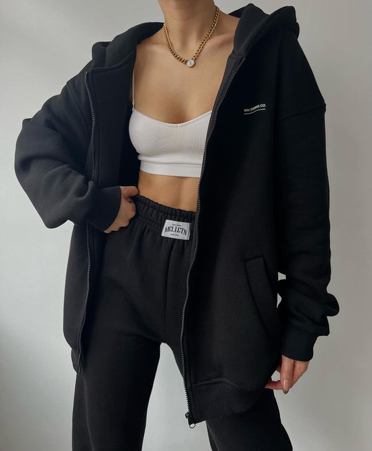 Damen Oversize Kapuzen-Sweatjacke mit Reißverschluss und High-Waist Jogginghose Set Nord Taschen
