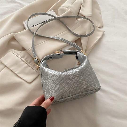 Damen Umhängetasche mit eleganter Schlangenprägung und praktischem Schulterriemen Nord Taschen