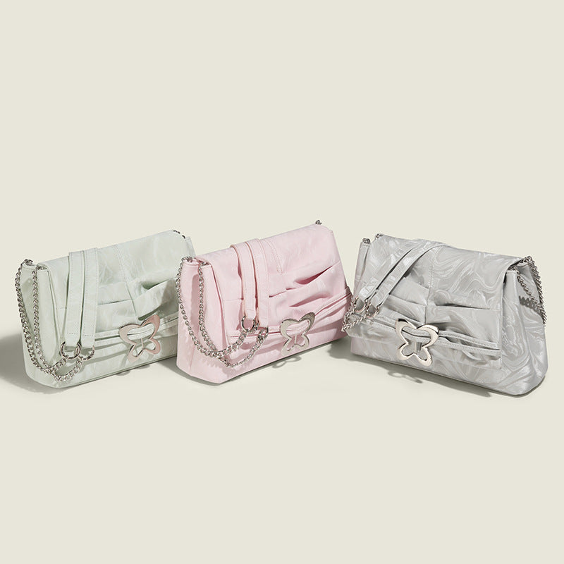 Damen Umhängetasche mit verspieltem Schmetterlingsdesign und eleganter Faltenoptik Nord Taschen