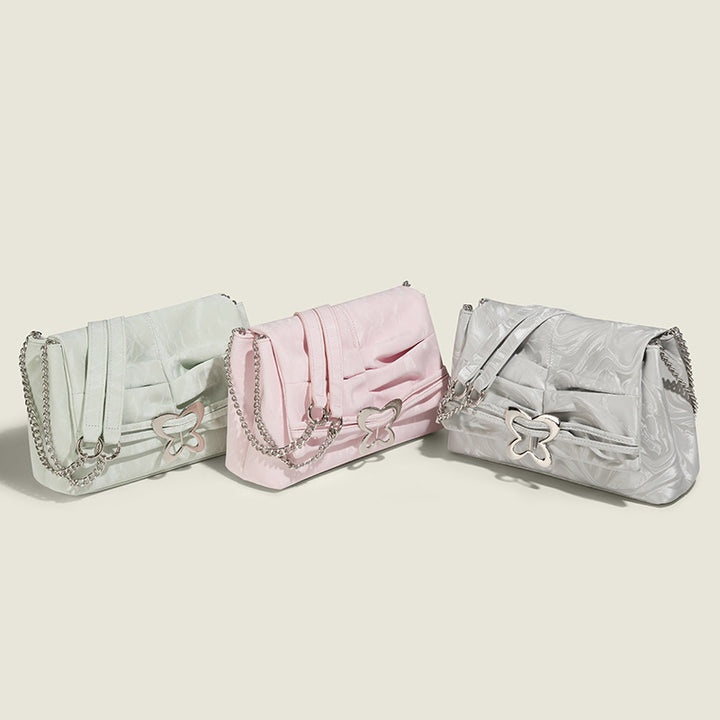 Damen Umhängetasche mit verspieltem Schmetterlingsdesign und eleganter Faltenoptik Nord Taschen