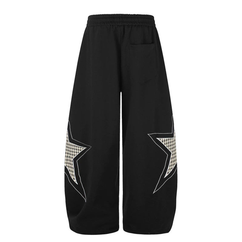 Damen weite Palazzo-Sweathose mit Stern-Applikationen und Karo‑Einsätzen Nord Taschen