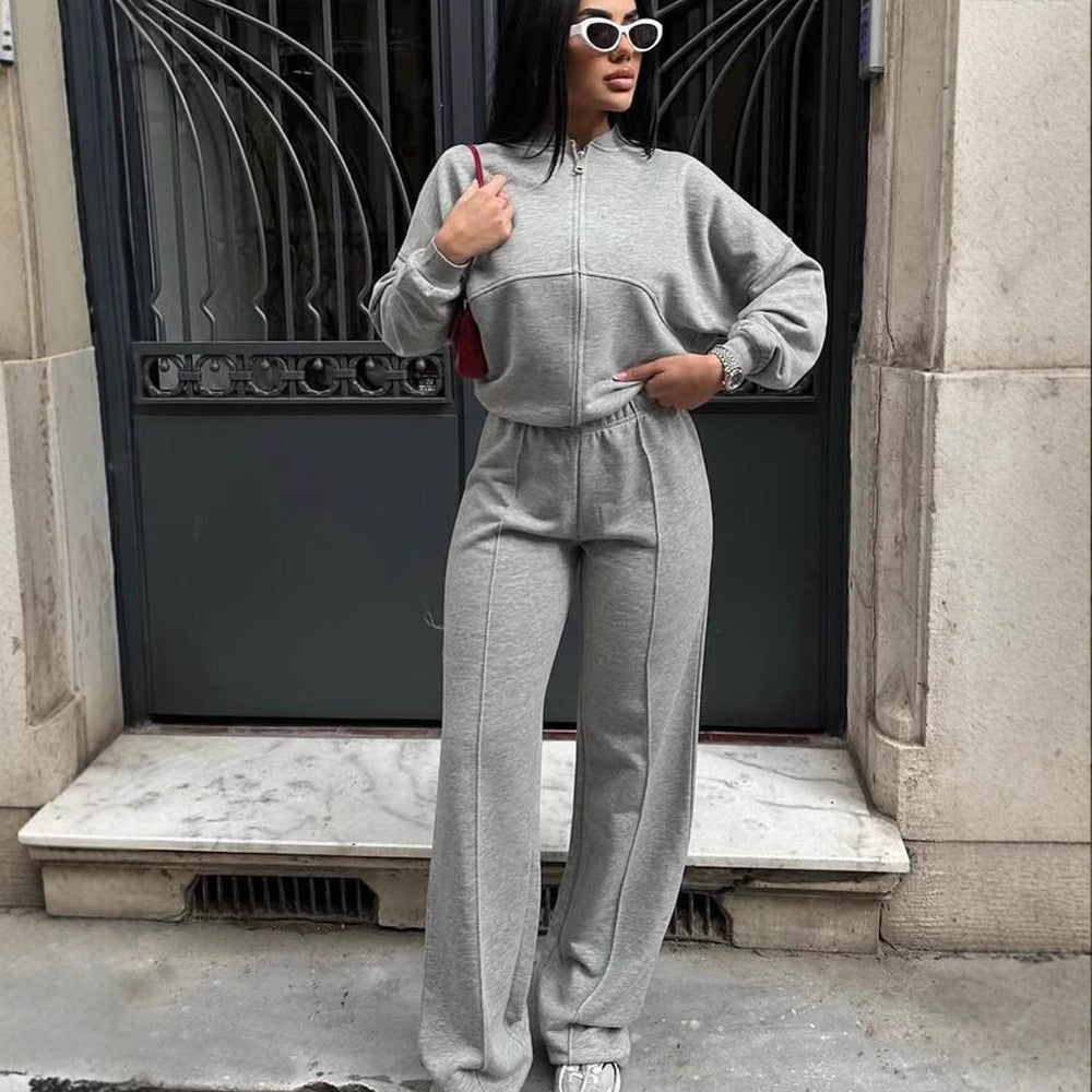 Damen sportive Oversize-Fleecejacke mit diagonaler Reißverschluss-Optik und weit geschnittener High-Waist-Jogginghose Nord Taschen