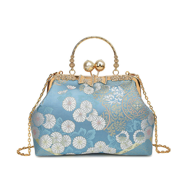 Damen elegante Umhängetasche mit floralem Design und Kunstlederakzenten Nord Taschen