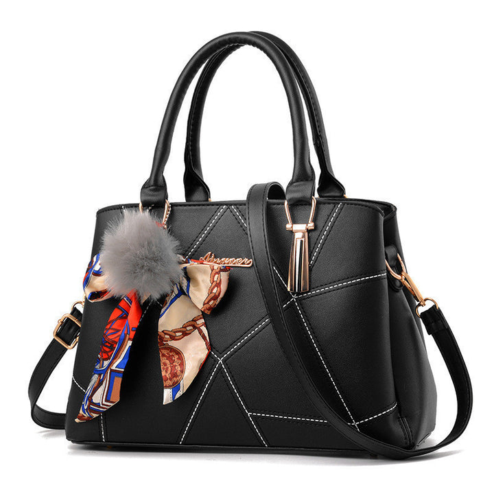 Damen Handtasche mit elegantem geometrischem Design und verspieltem Schal Nord Taschen