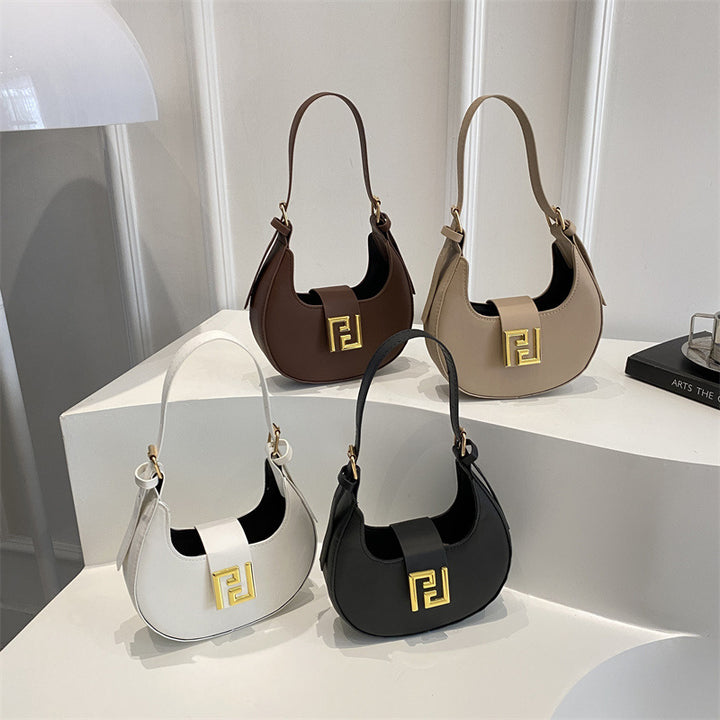 Damen Handtasche mit modernem Design und goldenen Akzenten Nord Taschen