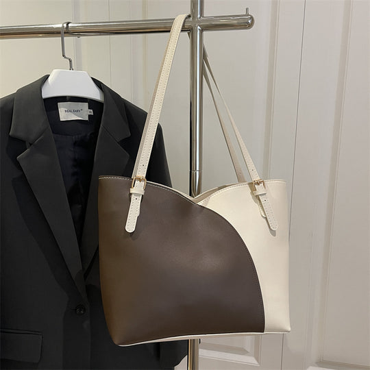 Damen elegante Handtasche mit asymmetrischem Design und robusten Trageriemen Nord Taschen