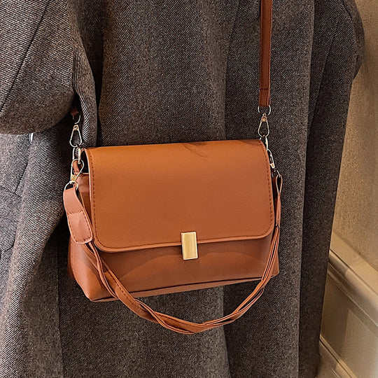 Damen Umhängetasche mit elegantem Klappverschluss und verstellbarem Tragegurt Nord Taschen