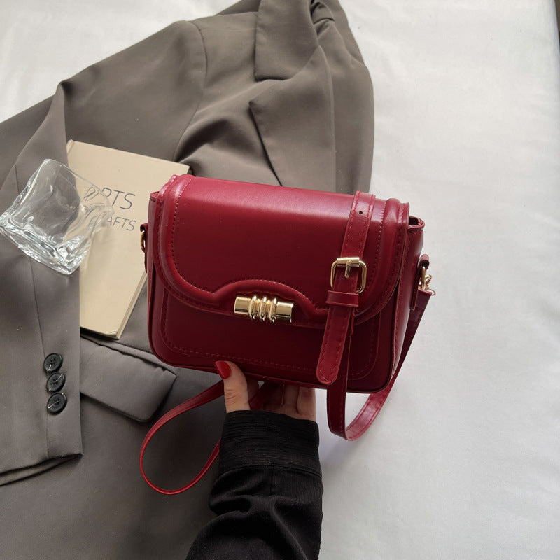Damen elegante Umhängetasche mit strukturiertem Design und goldfarbenem Verschluss Nord Taschen