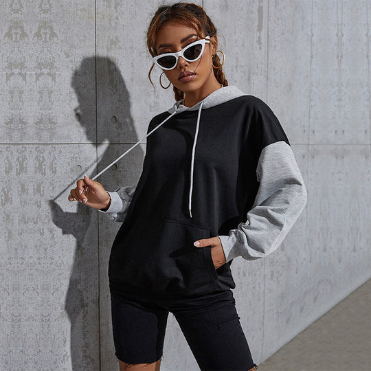 Damen Oversize Sweatshirt mit Kapuze, Kontrastärmeln und Kängurutasche Nord Taschen