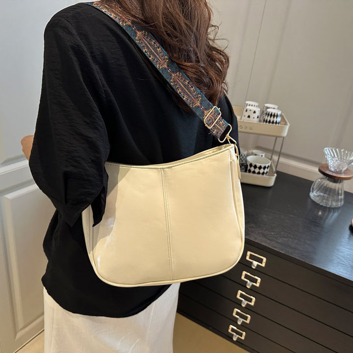Damen elegante Umhängetasche mit kunstvollem Tragegurt Nord Taschen