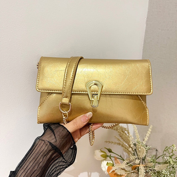 Damen elegante Handtasche im zeitlosen Design mit metallischen Akzenten Nord Taschen