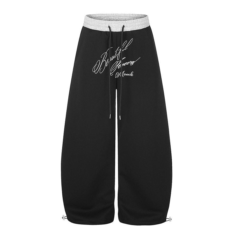 Damen Weite Culotte-Sweatpants mit hohem Bund, Tunnelzug und elegante Script-Print Nord Taschen